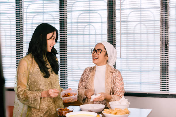 istock Young Beautiful Woman Preparing Food For Eid Mubarak 2205044198