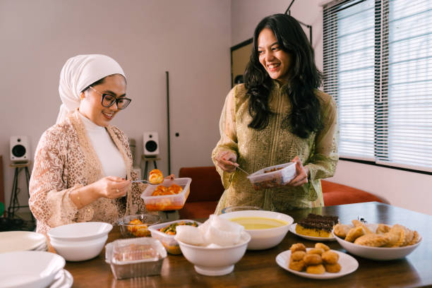 istock Young Beautiful Woman Preparing Food For Eid Mubarak 2205044207