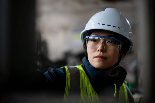 istock Asian female engineers operate  CNC 2205044584