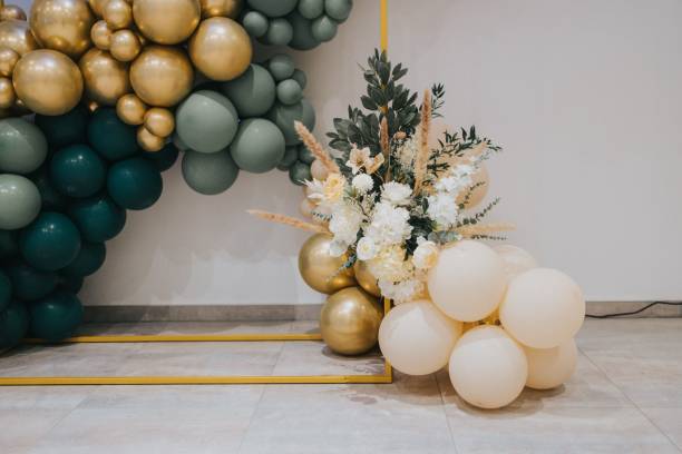 istock Elegant balloon arch with floral arrangements. 2205044670