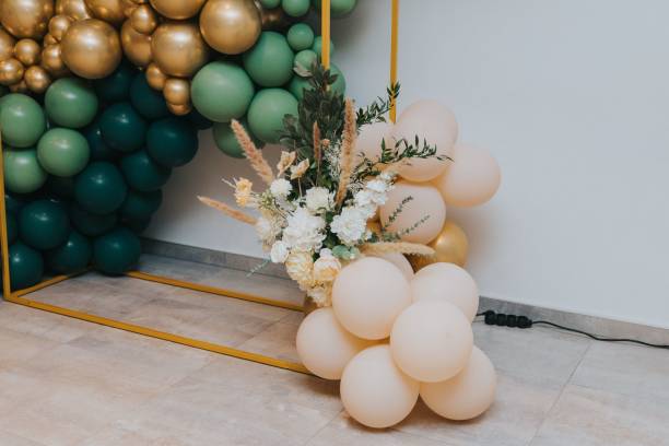 istock Balloon arch with floral decorations 2205044674