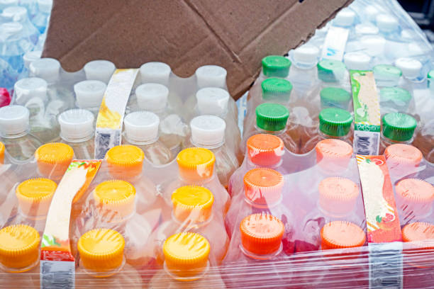 istock packed drinks in plastic bottles and wrapped in stretch film 2205044789