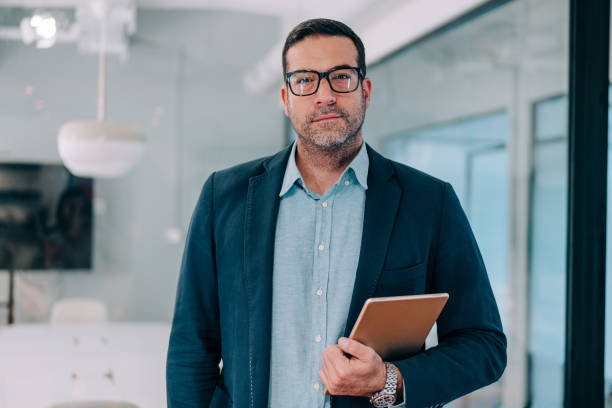 istock Confident businessman in modern office. 2205045614