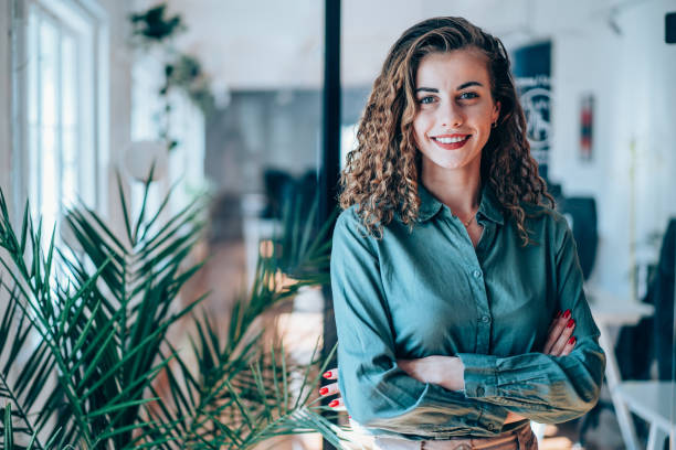 istock Confident businesswoman in modern office. 2205045664