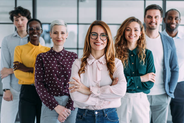 istock Confident businesswoman and her team. 2205046307