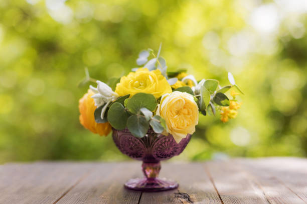 Yellow bouquet with roses,ranunculus,chrysanthemums and eucalyptus