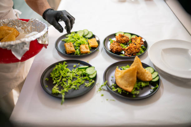 istock Indian chef preparing traditional food in restaurant kitchen 2205048464