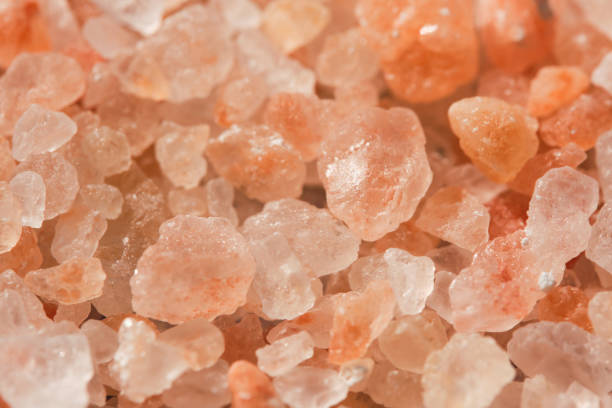 istock Background is crystals of pink sea salt. 2205055582