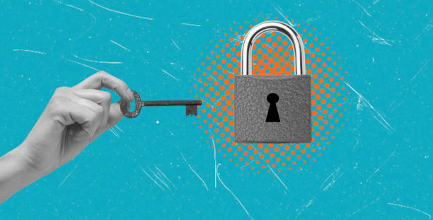istock An artistic art collage depicts a hand trying to open a closed lock. 2205056175