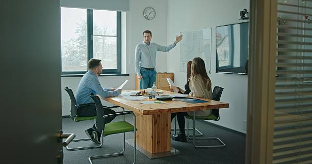 istock Join us for a Collaborative Team Meeting in a modern office that fosters creativity 2205058147