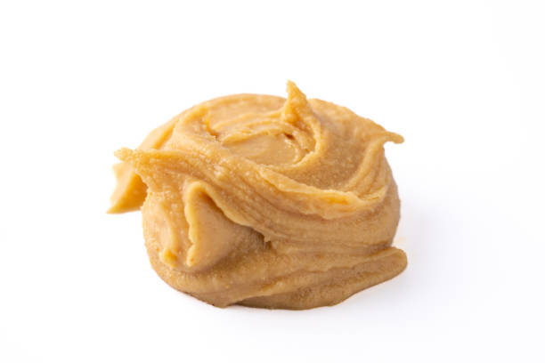 istock Delicious and healthy peanut butter on white background 2205063261