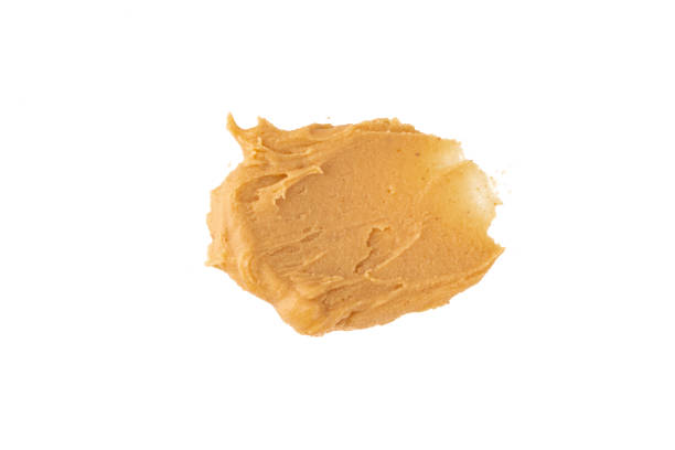 istock Delicious and healthy peanut butter on white background 2205063368
