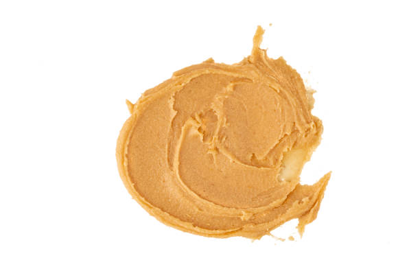 istock Delicious and healthy peanut butter on white background 2205063374
