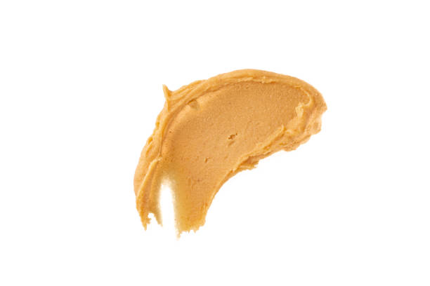 istock Delicious and healthy peanut butter on white background 2205063380