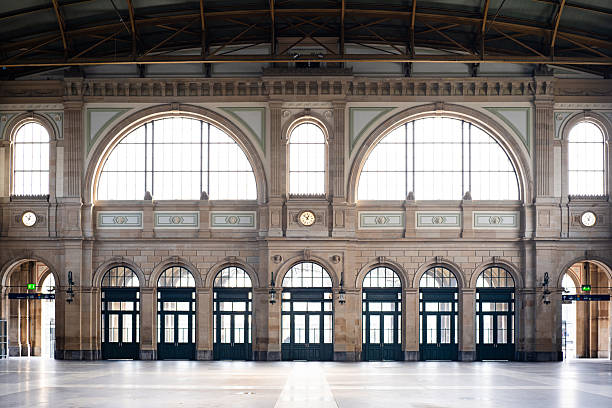 Zurich international main train station. Interior atrium hall view,beautiful architecture, large arches, natural daylight, wide angle, no people.