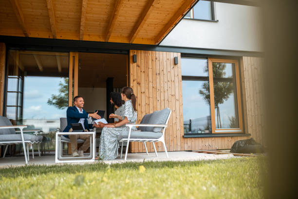 istock Successful Home Purchase with Hispanic Agent and Diverse Buyers 2205068611