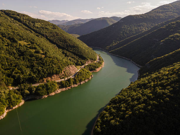 istock Mountain Water Dam In Spring With Green Nature. Aerial view 2205068934