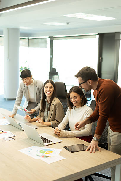 istock Team collaboration in a modern office environment during a productive brainstorming session 2205071294