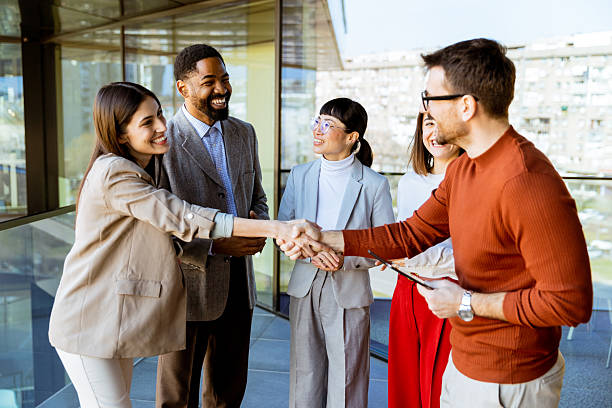 istock Networking and collaboration flourishes during a business meeting in a modern office setting 2205071311