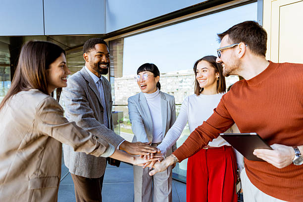 istock Team members engage in a joyful collaboration during a strategy meeting in a modern office setting 2205073812