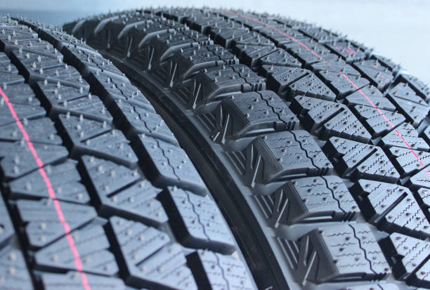 istock Rubber Surface Of Modern Tires With Red Marks On It 2205079504