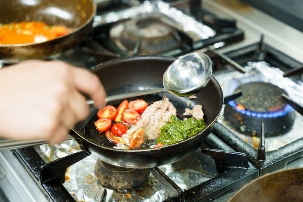 istock Cooking Tuna with Cherry Tomatoes and Pesto 2205082856