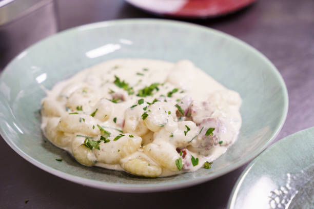 istock Creamy Gnocchi with Parsley Garnish 2205082872