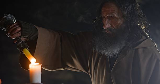 istock A Mystical Candle Ritual Involving An Elderly Figure Surrounded by Enigmatic Shadows 2205089026