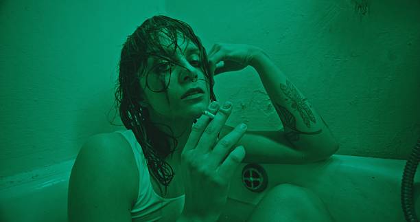 istock A moody and evocative bath scene characterized by green lighting, introspection, and depth 2205091518