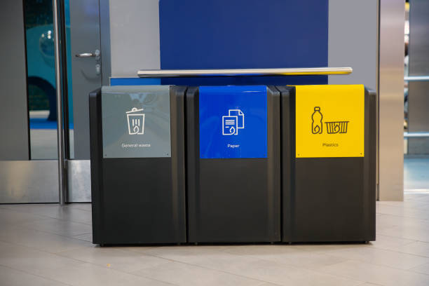 istock Set of recycling bins promoting waste sorting and environmental awareness 2205091673