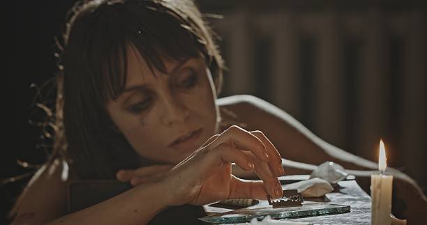 istock An Intense and Profound Moment of Deep Reflection and Solitude Captured in Dim, Gentle Light 2205092069