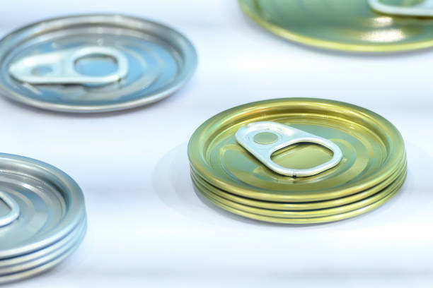 Close up scene the aluminum can lid on the white background.  The canned food packaging manufacturing  concepts.
