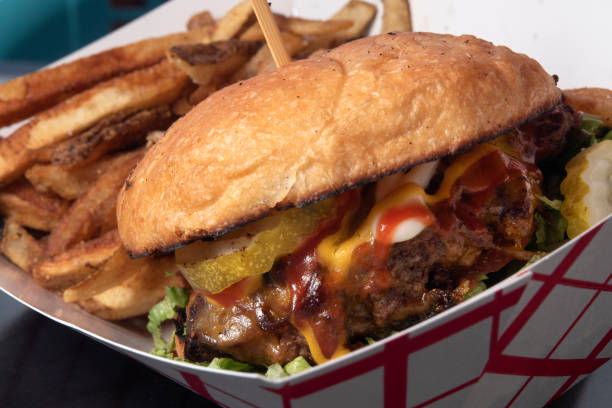 istock Deluxe Burger with Fries Served 2205092757