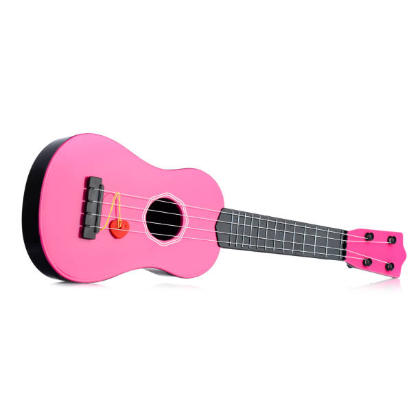 istock Children's pink guitar on a white background. 2205095764