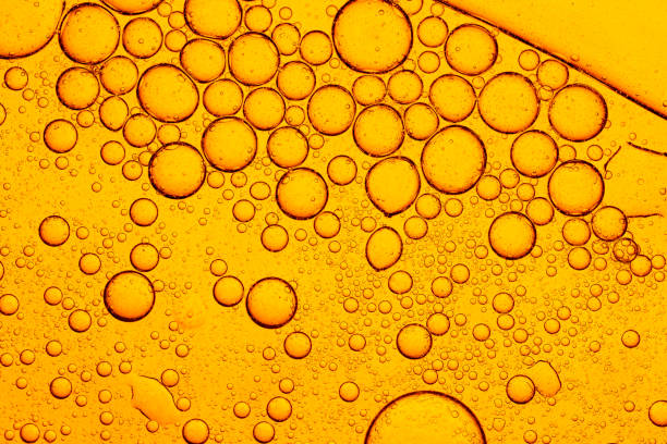 istock Yellow Macro Drink Bubbles,Realistic beer foam with bubbles. Beer glass with a cold drink. Background for bar design, Beer Fest flyers. 2205097151