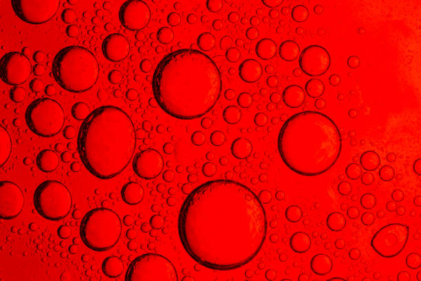istock Red macro bubble,Red wine on a black background, abstract splashing,Red wine abstract splashing in glass. Macro shot. Copy space. 2205097170