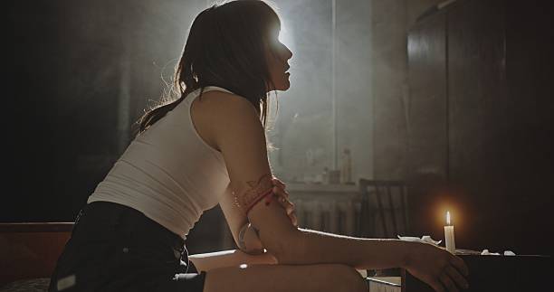 Creating a Mystical Atmosphere with the Use of Candlelight and a Silhouette Design