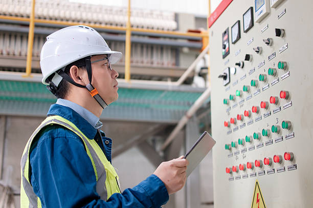 istock Asian engineers are working in the power distribution room. 2205099121