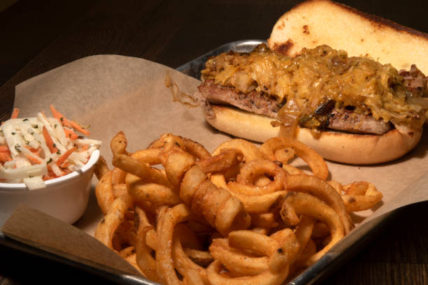 istock Cheese Steak Sandwich with Fries Horizontal 2205099307