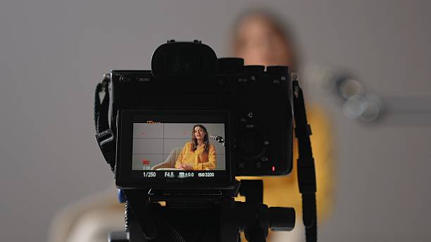 istock Engaging Conversation in a Podcast Studio With a Woman Sharing Her Insights 2205101560