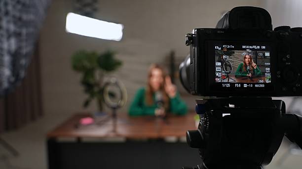 istock Engaging Conversation in a Podcast Studio With a Woman Sharing Her Insights 2205101963