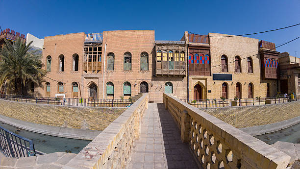 istock Historic Brick Building with Colorful Windows 2205102236
