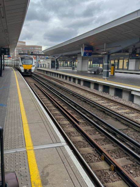 istock Modern Train Station with Approaching Train – Urban Transportation 2205103567
