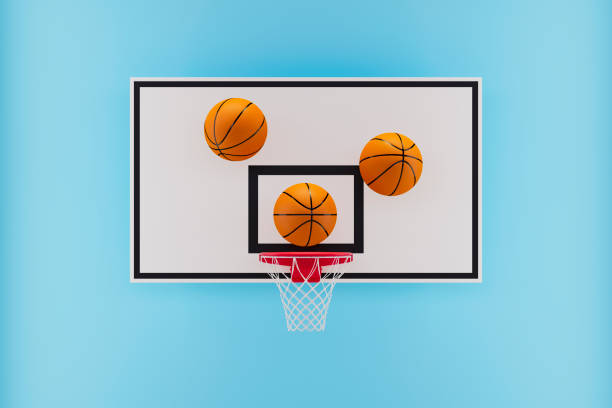 istock Basketball Hoop with Flying Basketballs 2205104896