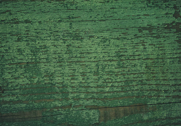 Weathered green painted wood surface background texture