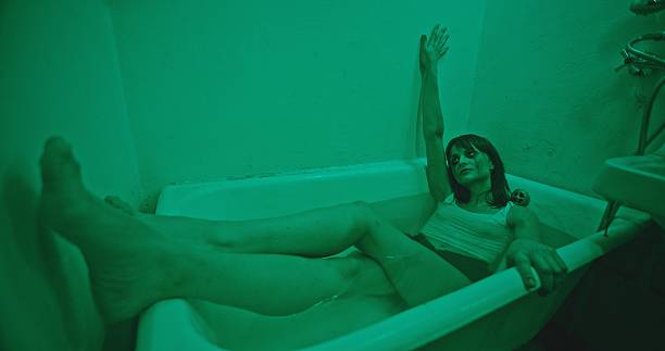 istock A Surreal Bathtub Scene That Emphasizes Striking Green Lighting Effects and Various Colors 2205115048