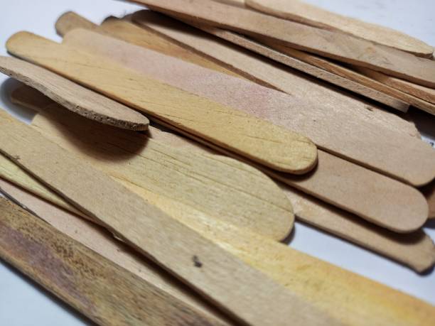istock Wooden ice cream stick isolated on white background 2205119188