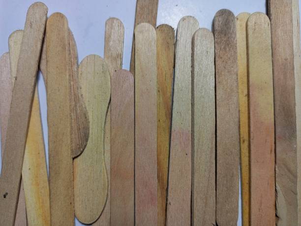 istock Wooden ice cream stick isolated on white background 2205119210