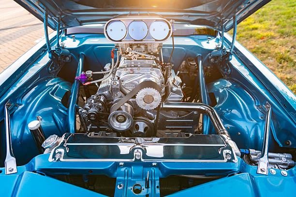 Shot on the blower injector on the mask of classic muscle car.