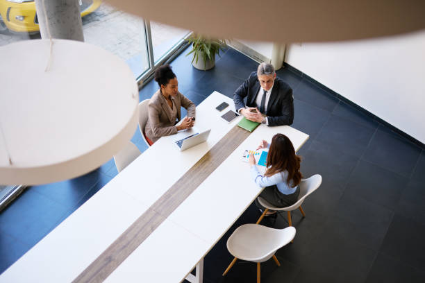 istock Business team discussing during a meeting in a modern office 2205123881
